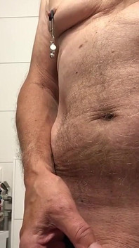 Showing Hard Nipples off While Pissing