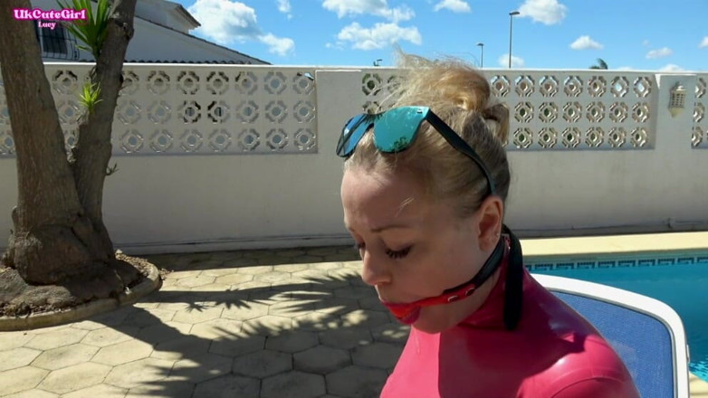 UKCuteGirl Lucy Lauren: Sunbathing Gagged in Latex - Shiny Messy Drool Whore