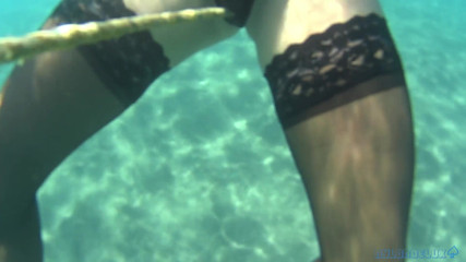 Nylondelux: Black Stocking in the Sea