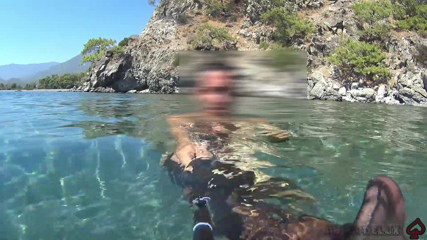 Nylondelux: Black Stocking and Anal Beads in the Sea