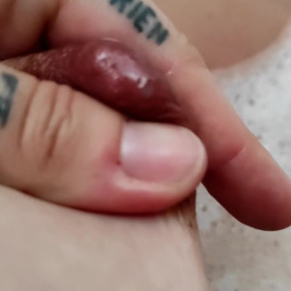 MilkyNippleMilf: Tattooed swiss Milf milking her nipple (first drops)