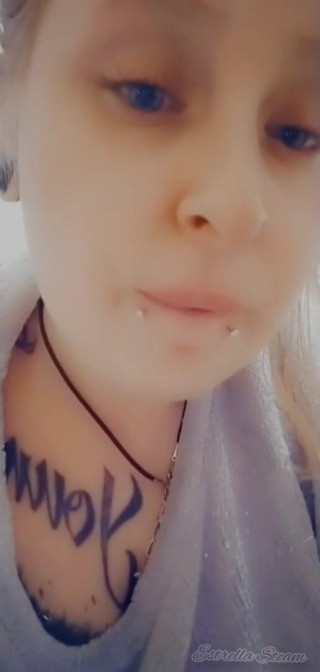 Estrella Steam: Girl with piercings smokes a cigarette