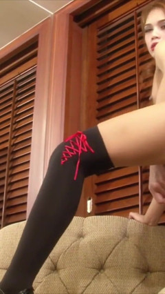 T-girl Alice strokes her cock hard