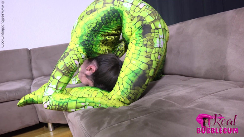 Flexilady: Spineless Lady in Shiny Green Catsuit