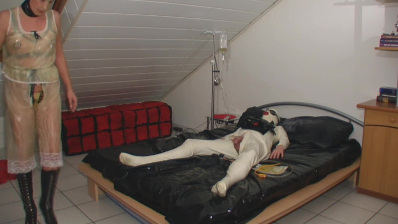 Rubber & Clinic Studio - 1ATOYS: Rubber slave treatment in rubberbed