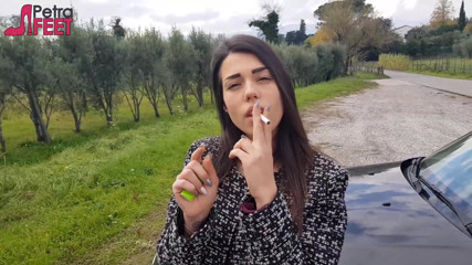 Smokin Fetish: Outdoors smoking cigar from sexy brunette