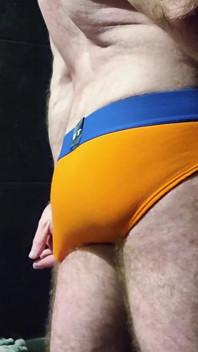 Muscle Bear Showing off His Uncut Cock