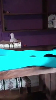 MILF with Beautiful Legs in Pantyhose and Heels Lying on the Table