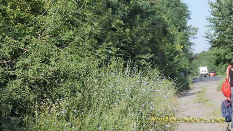 Pee Adventures: Skinny brunette hitchhiking with her bladder full