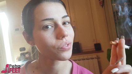 Smokin Fetish: Tempting Italian girl smokes a cigar in a close up...