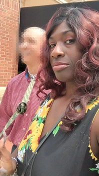 Queen Dreka Taking River on a Walk on His Lunch Break at His Corporate Job