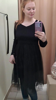 What Words Pop Into Your Head When You Look at the Red-haired Mistress in the Black Dress?