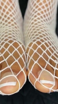 Ebony Girl Shows off Her Feet with French Pedicure in Her White Fishnets