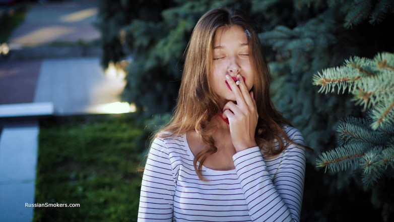 Russian Smokers: Sultry Russian Girl Smoking Cigarette by Waves