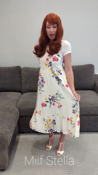 A Redhead in a Dress