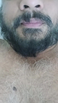 Indian Daddy Lying on the Bed Teasing and Posing for You