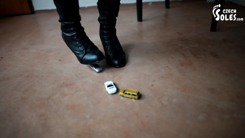 Czech Soles - foot fetish content: Madam Cat crushing puny cars under her boots