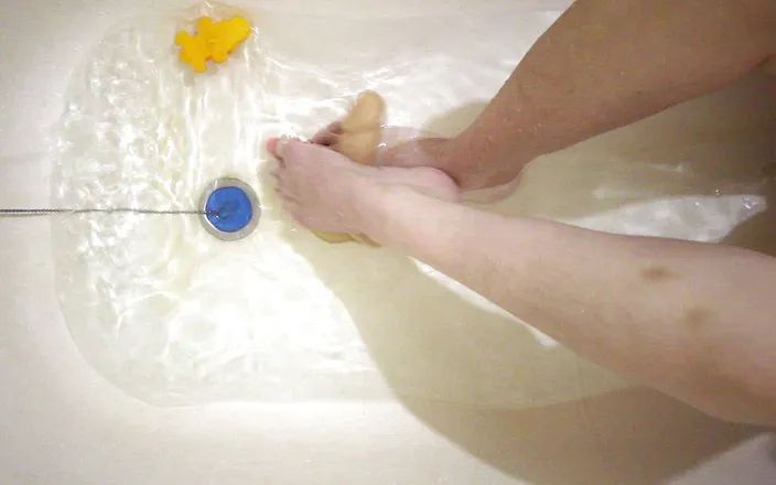 Hairypussyangel: Sexy legs in the bath, footjob and handjob
