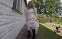 Horny vixen: Wedding Dress, Boots and Stockings Outdoors