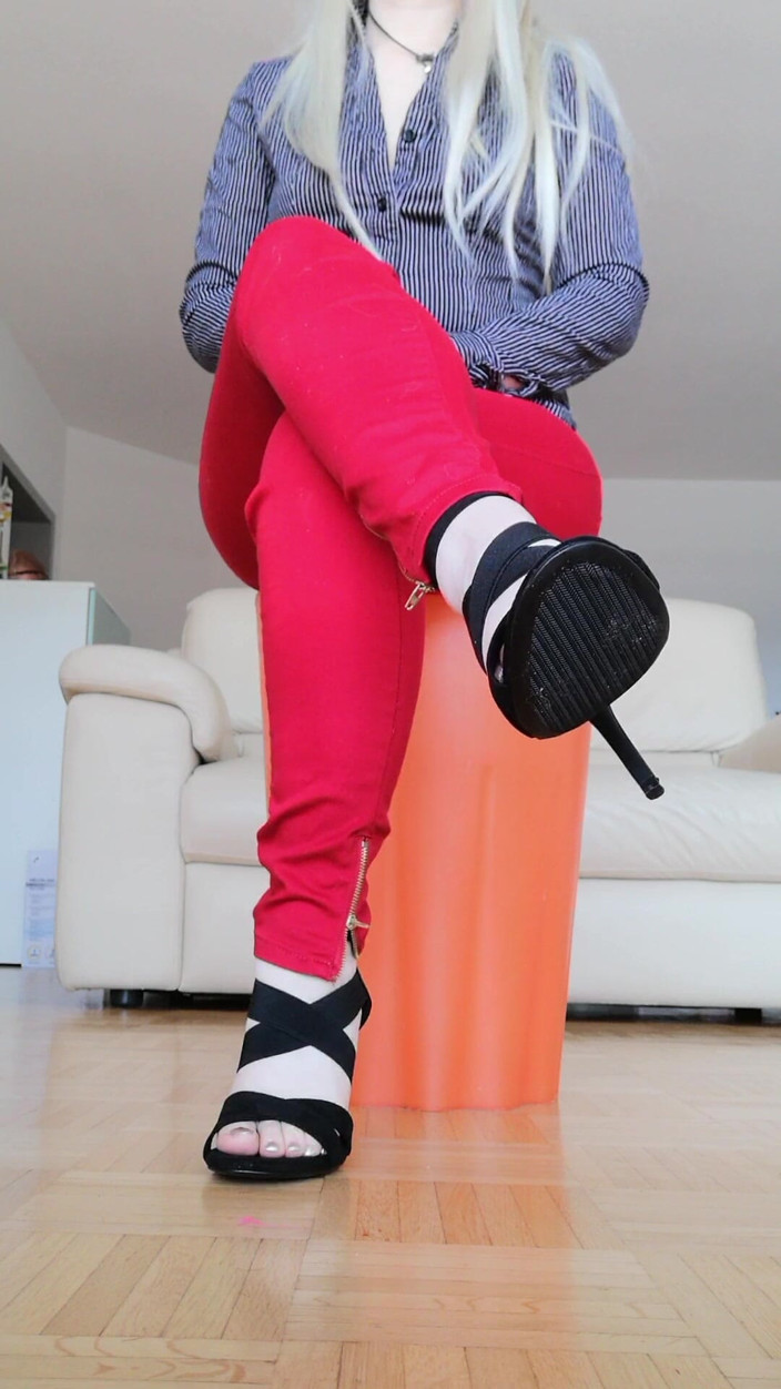 RavenBigAss: Raven Toe-tapping with Crossed Legs Red Jeans and High-heeled Sandals