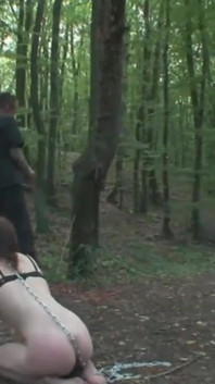 Humiliating whipping kneeling on the lake shore