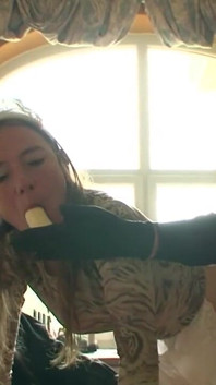Humiliating banana and hand in the red pussy