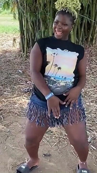 African Ebony Sexy Black Girl Dances in Public with Laughter