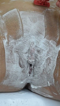 Close-up of Shaving the Vagina with a Trimmer and a Razor