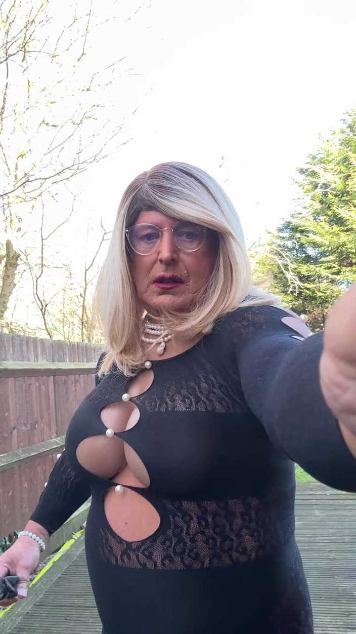 Kellycd2022: Sexy Crossdresser Kellycd2022 in Black Playsuit and Stripper Heels