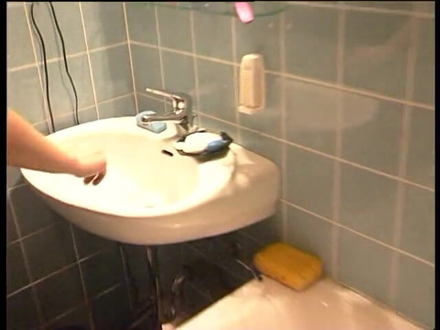Lucky Cooch: Woman pissing in the bathroom
