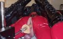 Hooded June: Red Enclosed Doll Fucks Itself with Fuckmachine