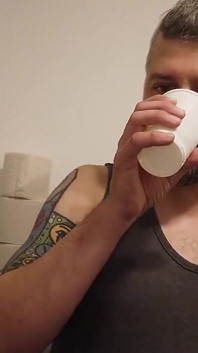 Tattooed Blonde Pees Into the Cup at the Toilet and Gets a Body Shot