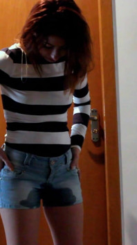 Skinny Redhead Pee in Her Short Jeans