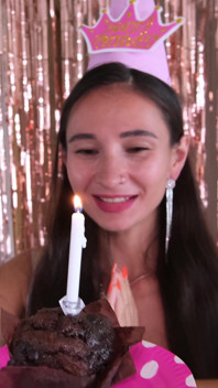 Birthday Girl Enjoy Super Creamy Cake with Candle