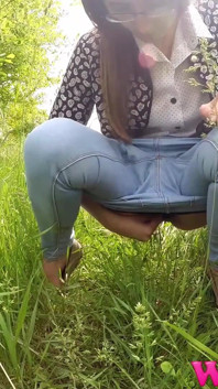 Full Bladder Skinny Brunette Pissing in the Woods in the Tall Grass