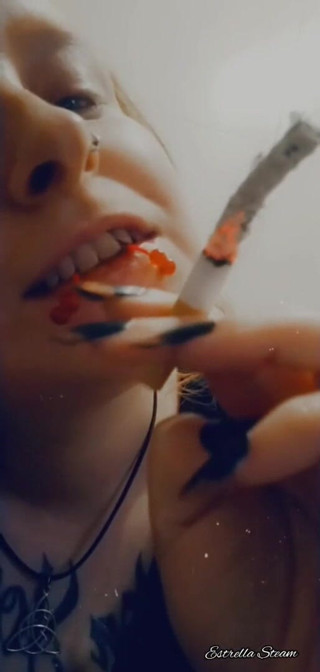Estrella Steam: Smoking girl close up
