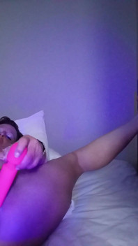 Masturbating