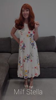 A Redhead in a Dress