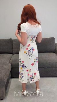 A Redhead in a Dress