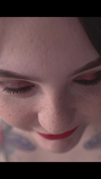 A Girl Is Messing with a Macro Camera