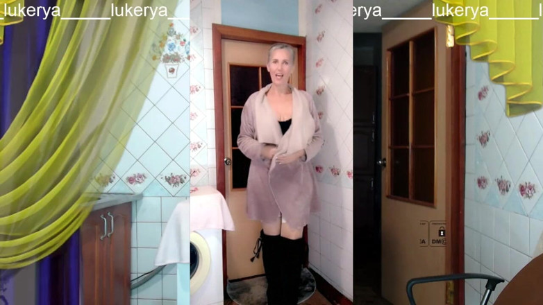 Lukerya: Encantadora Lukerya de meia-idade se aquece com um sorriso alegre...