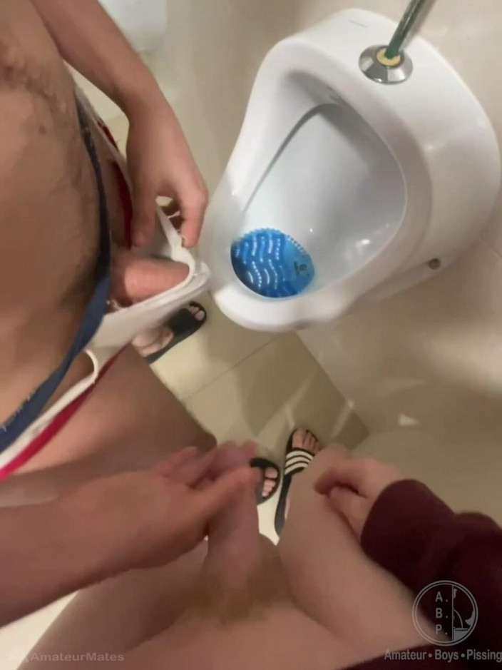 AmateurBoysPissing: 2 Boys Having Fun at the Pool Public Toilets' Urinal