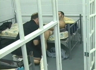 Bareback TV: Policeman fucking a hairy hunk in the custody