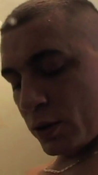 Her boyfriend spreads her pussy with his fingers before fucking her