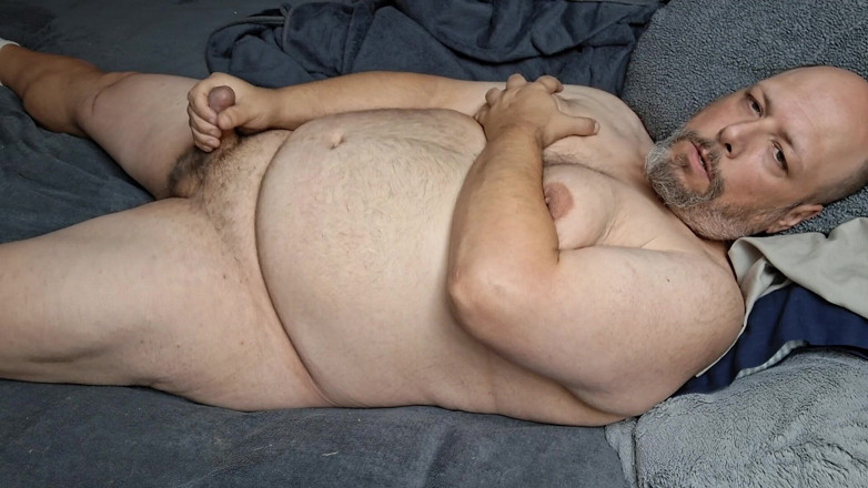 Printsofallsayings: Chubby Guy Lays in Bed and Cums