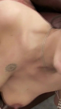 Seductive Brunette Gets Wild on the Couch