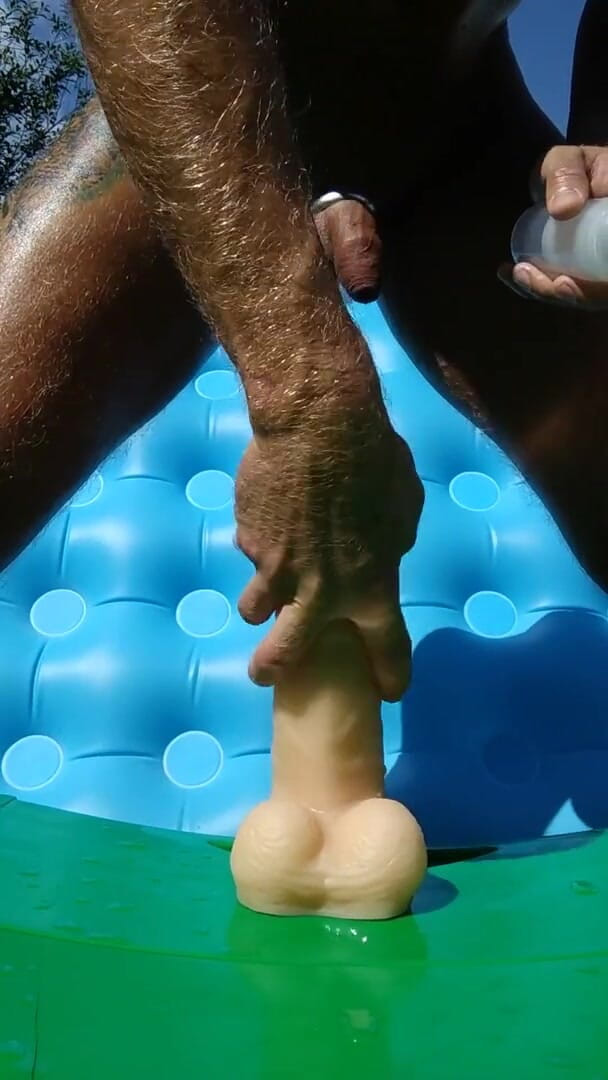 Latex Toys: Riding on a monster cock