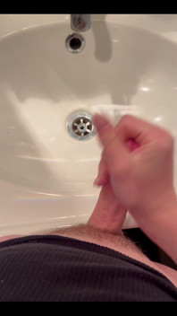 Masturbating