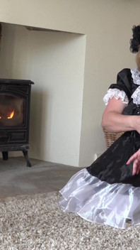 The maid - lighting the fire