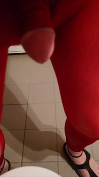 Pissing at Home in Red Legging with Penis Sleeve